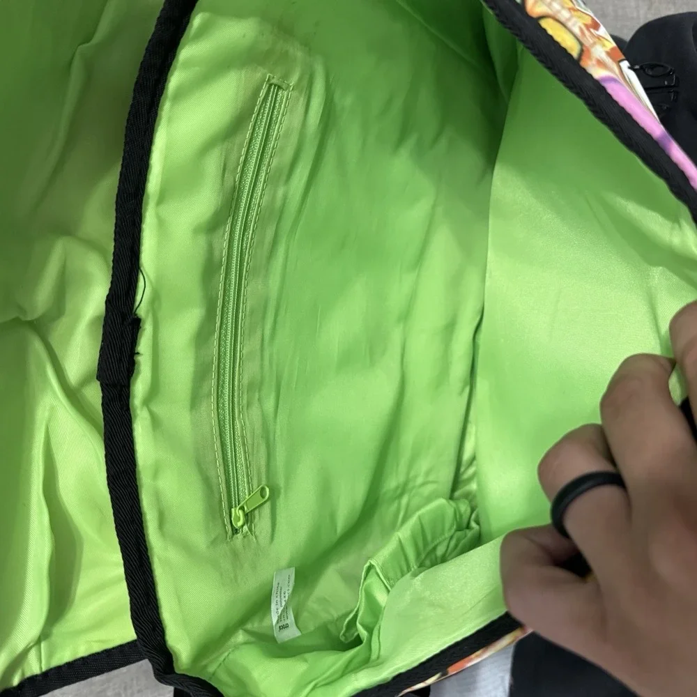Crocs Graffiti Dinosaur Messenger Bag Adult Lime Green Interior